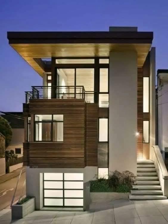 Casa moderna de madera al atardecer