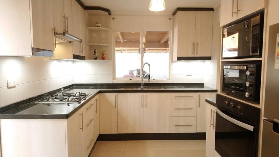 Cocina terminada con distribución en U